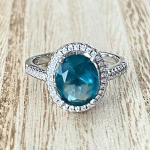 Oval Simulated Aquamarine Halo Ring - 925 Sterling Silver